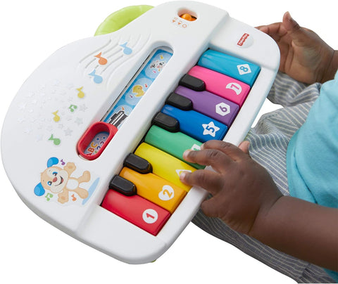 Fisher-Price Silly Sounds Light-Up Piano - UK English Edition, take-along toy piano with lights, real music notes and learning songs for baby and toddlers -- لعبة بيانو فيشر-برايس مضيء باصوات سخيفة مسلية للاطفال - ناطق باللغة الانجليزية